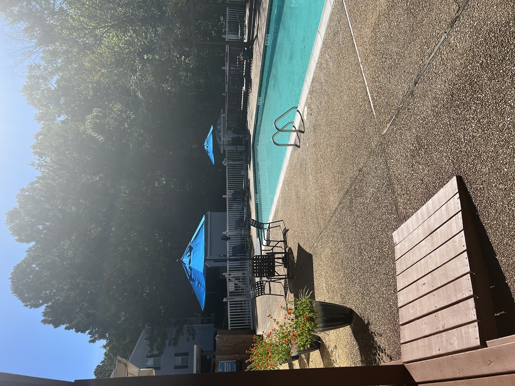 a view from above of two blue boats in the water